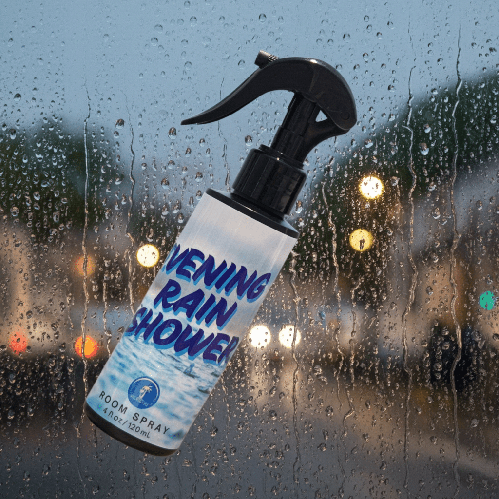 Spray bottle labeled 'Evening Rain Shower' against a rainy window background